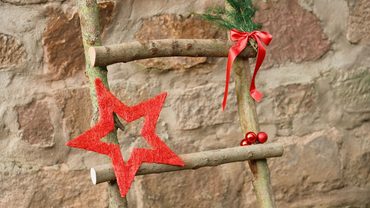 Kerstdecoratie voor buiten: zo geef je je tuin sfeer in december